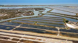 Economy Prints: Overview of saltpans showing water channels and salt evaporation processes in Algarve