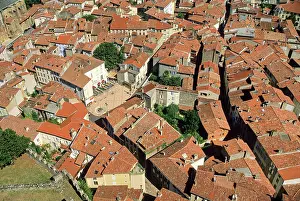 Neighborhood Prints: Overview of tiled rooftops in Foix from the castle in Occitanie region of France