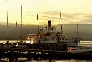 Lake Geneva Prints: Paddle boat on Lac Leman (Lake Geneva)