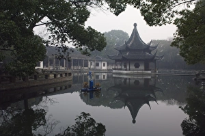 Images Dated 8th January 2008: A pagoda reflected in the water at West Garden Buddhist Temple, Suzhou