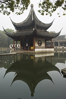 Images Dated 8th January 2008: A pagoda reflected in the water at West Garden Buddhist Temple, Suzhou