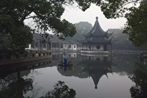 A pagoda reflected in the water at West Garden Buddhist Temple, Suzhou