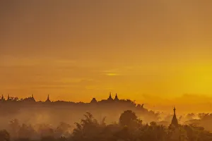 Mrauk U Prints: Pagoda spires at sunset, Mrauk U, Rakhine State, Myanmar (Burma), Asia