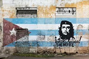 Closeup Shot Gallery: Painting of Che Guevara and Cuban flag on a wall, Havana, Cuba, West Indies, Caribbean
