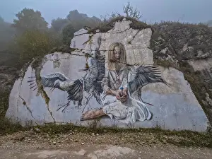 Birds Prints: Painting of a woman with birds on a rock in mountains of North Ossetia, Russia