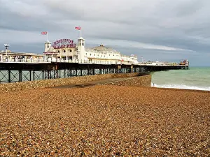 Enjoying Prints: Palace Pier features a long walkway with visitors enjoying the views over the beach