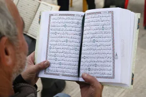 Quran Prints: Palestinians reading the Koran outside Al-Aqsa mosque, Jerusalem, Israel, Middle East