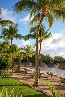 Umbrellas Prints: Palm trees and beach at Le Touessrok resort