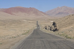 Absence Prints: Pamir Highway leading into wilderness, Tajikistan, Central Asia
