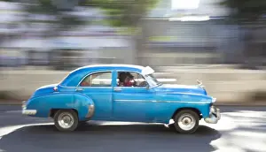 Vintage Car Prints: Panned shot of old American car to capture sense of movement