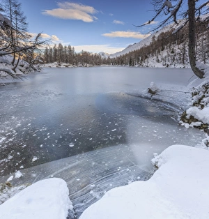 Sondrio Prints: Panorama of frozen Lago Azzurro at dawn, Spluga Valley, Province of Sondrio, Valtellina