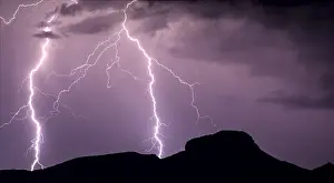 Electricity Prints: A panorama photo of lightning striking the slopes of Woolsey Peak during the 2012