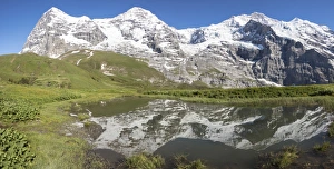 Canton Of Bern Prints: Panorama of snowy peaks reflected in the alpine lake, Wengernalp, Wengen, Bernese Oberland