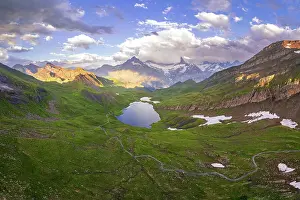 Grindelwald Prints: Panoramic aerial view of Bachalpsee with clouds surrounding the Bernese Oberland mountains