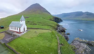 Panoramic of Church of Vidareidi by the sea, Vidoy Island, Faroe Islands, Denmark