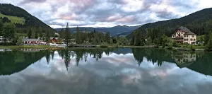 Panoramic of lake Dobbiaco at sunset in summer, Dobbiaco (Toblach), Dolomites