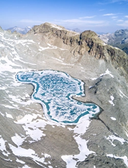 Typically Swiss Prints: Panoramic of Lej Lagrev during the thaw, St. Moritz, Engadine, Canton of Graubunden