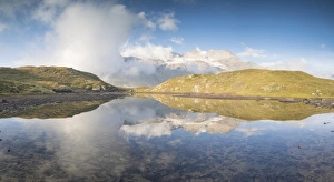 Poschiavo Valley Prints: Panoramic of mountain peaks reflected in lake, Bernina Pass, Poschiavo Valley, Engadine