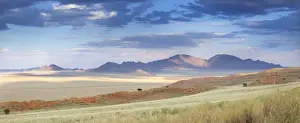 Sparse Prints: Panoramic view at dusk over the magnificent landscape of the Namib Rand game reserve