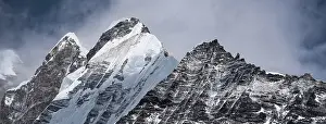 Himalayan Prints: Panoramic View of Langtang Lirung and Its Rugged Neighbors Seen Across the Langtang Valley Under Dramatic Skies