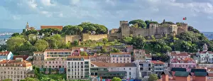 Alfama Prints: Panoramic view of Lisbon Castle from Miradouro da Senhora do Monte scenic point on a sunny day in the Alfama District