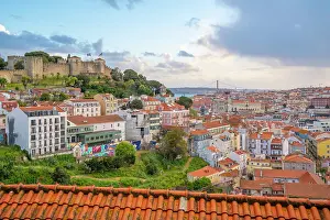 Alfama Prints: Panoramic view of Lisbon Castle from Miradouro da Senhora do Monte scenic point on a sunny day in the Alfama District