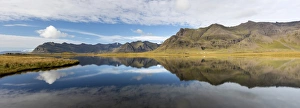 South Iceland Prints: Panoramic view of mountains and blue sky reflecting in lake, near Vik, South Iceland
