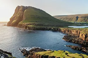 Coastal Cliffs Prints: A panoramic view of a rugged coastal landscape of Suduroy in the Faroe Islands