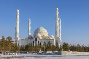 Pillars Prints: Panoramic view of snow-white modern Hazaret Sultan mosque sunny morning