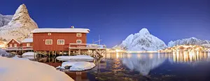 Stilt House Prints: Panoramic view of snowy peaks and the frozen sea on a starry winter night, Reinevagen Bay