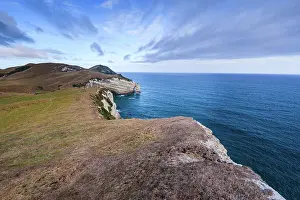 Zealand Prints: Panoramic view of steep headlands and turquoise sea at Cape Farewell northern tip of South Island New Zealand