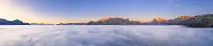 Valtellina Prints: Panoramic view of Valmalenco at sunrise covered by a sea of clouds