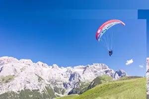 Pinzolo Prints: A paraglider among rocky peaks and green meadows Doss Del Sabion