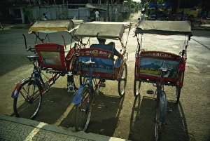 Trishaws Prints: Parked becaks (trishaws), Bogor, West Java, Indonesia, Southeast Asia, Asia
