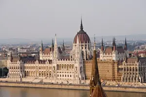 Parliament Building Prints: Parliament Building on the Danube with Calvinist Church in foreground