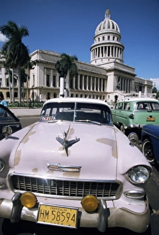 Taxi Cab Prints: Parliament House and 1950s American cars, Havana, Cuba, West Indies, Central America