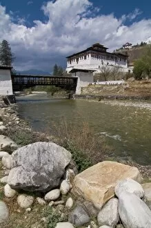 The Paro Tsong (a old castle) and a wooden covered bridge, Paro, Bhutan, Asia