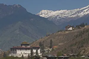 The Paro Tsong, old castle, with the Himalaya mountains in the background, Bhutan, Asia