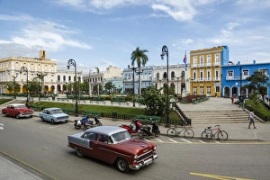 Vintage Car Prints: Parque Serafin Sanchez square, Sancti Spiritus, Cuba, West Indies, Caribbean, Central