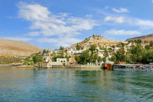 Whitewashed Prints: Partly submerged mosque of Eski Halfeti due to the construction of the Birecik Dam on the Euphrates River