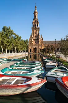 Passenger Boat Prints: Passenger boats in front of the North Tower of Plaza de Espana, Parque de Maria Luisa