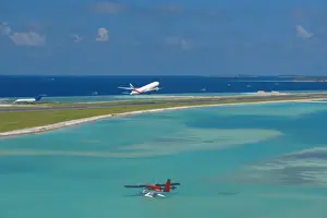 Access Prints: Passenger jet taking off from Male International Airport