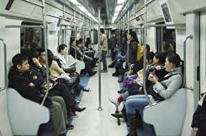 Images Dated 27th October 2007: Passengers on the Beijing subway, Beijing, China, Asia