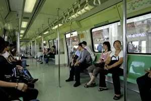 Images Dated 23rd May 2007: Passengers on a mass rapid transit train in Singapore, Southeast Asia, Asia