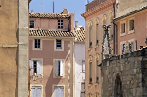 Aude Prints: Pastel coloured facades in the Rue Droite, Narbonne, Aude, Languedoc-Roussillon