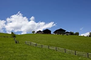 Pasture and farm houses in Nova Ponente village, Bolzano province, South Tyrol