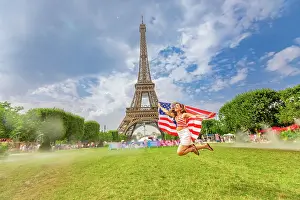 International Prints: Patriotic American Woman Jumping and cheering at the Paris 2024 Olympics