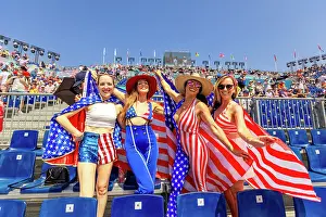 Enjoying Prints: Patriotic American Woman jumping and cheering for Team USA