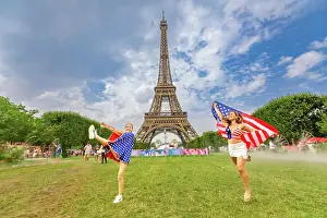 Public Park Prints: Patriotic American Woman jumping and cheering for Team USA