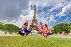 International Prints: Patriotic American Woman jumping and cheering for Team USA